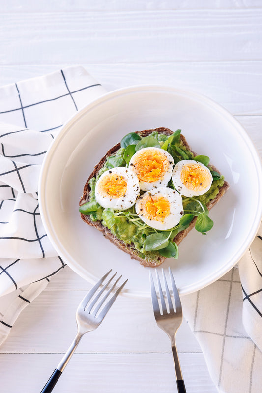 Smashed Avocado and Boiled Eggs on Sourdough